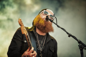 Commercial Advertisement Ad Photoshop Photography Music Concert Festival Tour Backstage Stage - by Julian Erksmeyer Skindred Red Beard Ginger Guitar Sunglasses